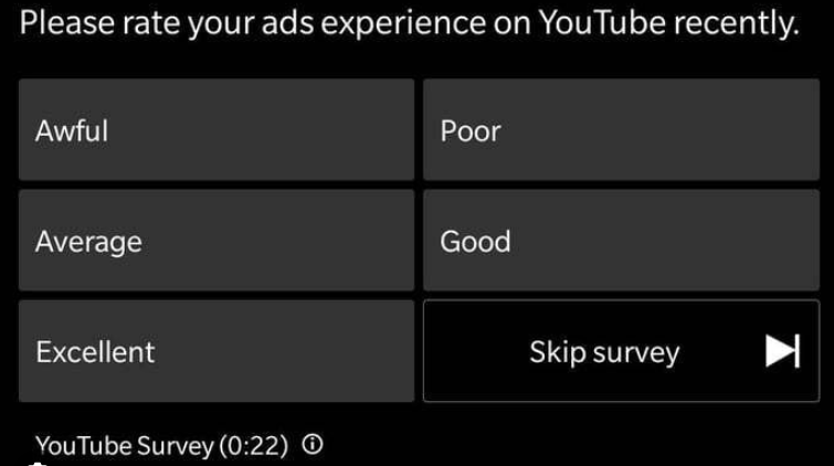 YouTube video interface with pop-up survey asking for feedback on content or ads.